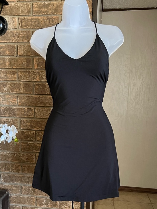 Lovetree Dresses & Skirts - NWOT mini dress with open back and crisscross spaghetti straps